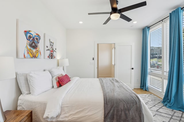 bedroom featuring ceiling fan and light wood-type flooring