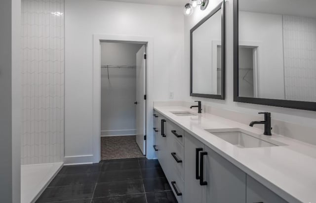 bathroom featuring tile patterned floors and vanity