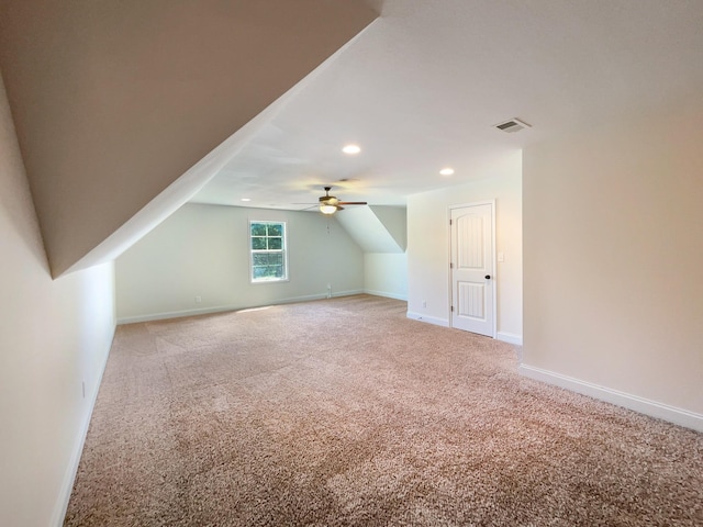 additional living space with lofted ceiling and carpet floors