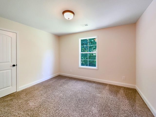 spare room with carpet flooring