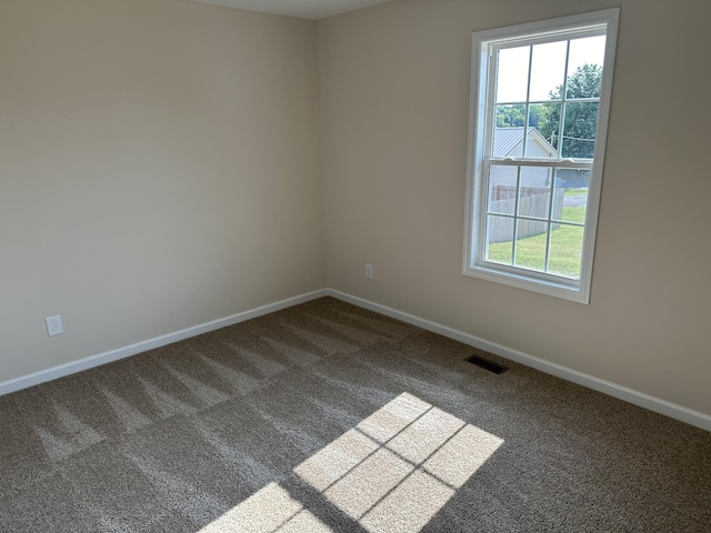 empty room with carpet floors