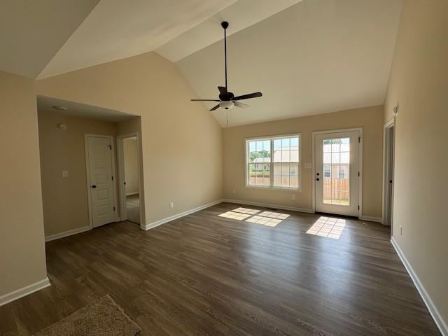 unfurnished living room with ceiling fan, dark hardwood / wood-style flooring, and vaulted ceiling