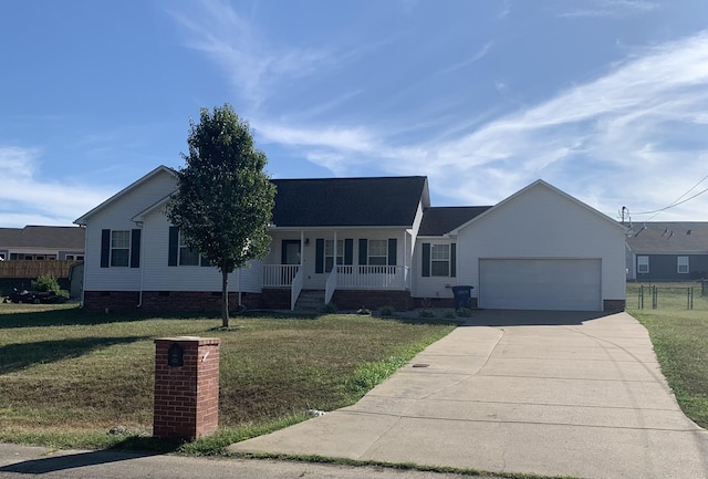 ranch-style house with a front yard, covered porch, and a garage