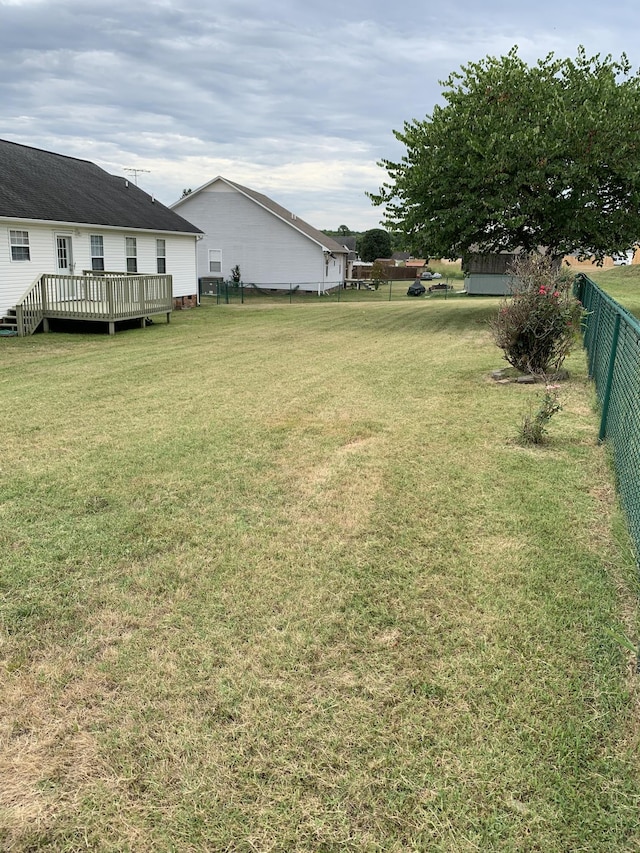 view of yard featuring a deck