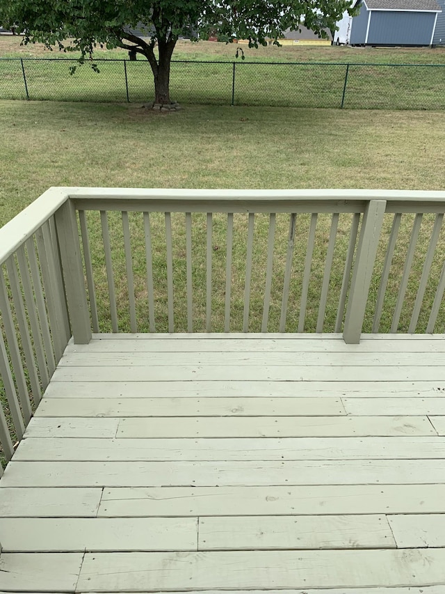 deck featuring a yard