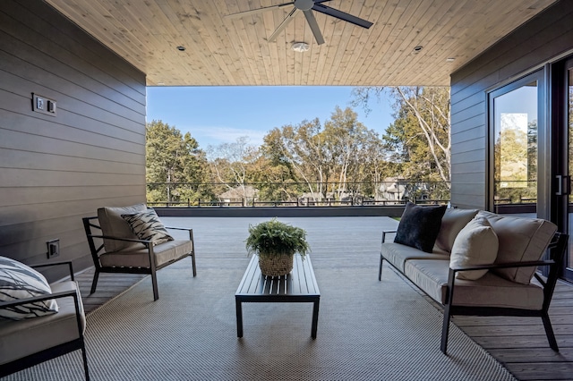 view of patio featuring ceiling fan, an outdoor hangout area, and a balcony