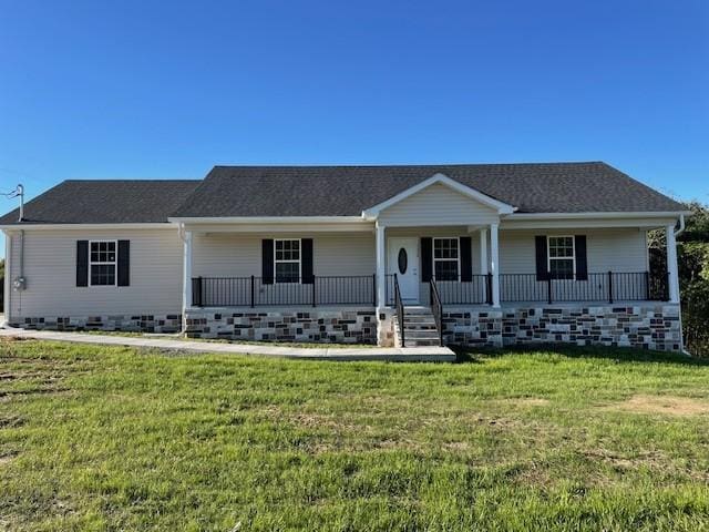 single story home featuring a front lawn and covered porch