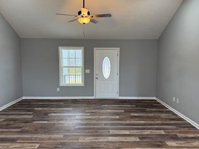 foyer featuring a ceiling fan, dark wood-style floors, and baseboards