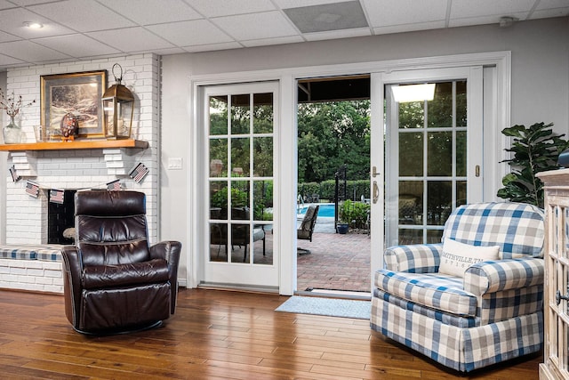 entryway featuring hardwood / wood-style floors and a drop ceiling