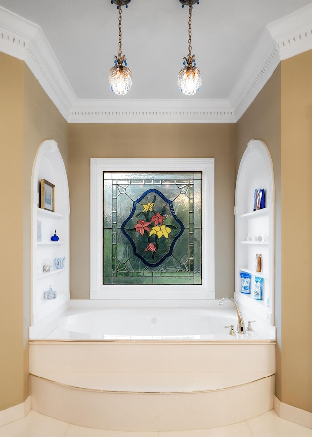 bathroom featuring a bath, built in features, and ornamental molding