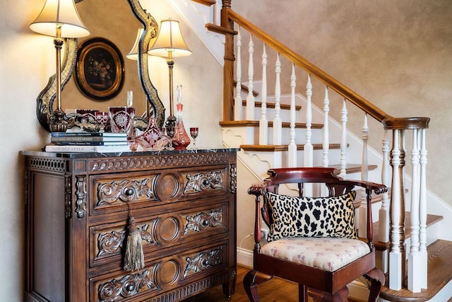 sitting room with hardwood / wood-style flooring