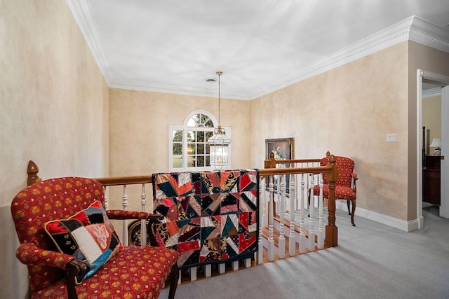 sitting room with carpet flooring and crown molding