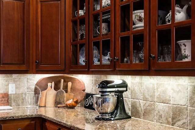 room details with tasteful backsplash and light stone counters