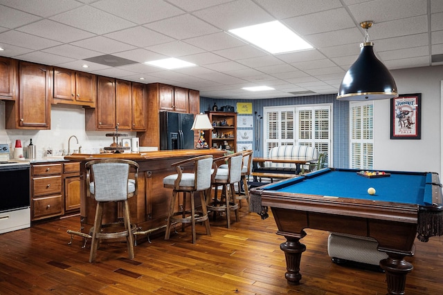 rec room featuring a paneled ceiling, sink, dark wood-type flooring, and billiards