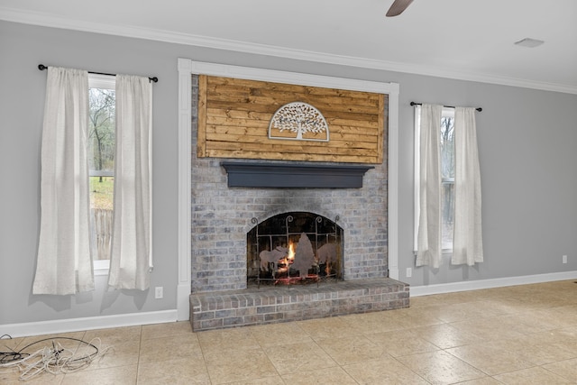 unfurnished living room with plenty of natural light, a fireplace, ornamental molding, and ceiling fan