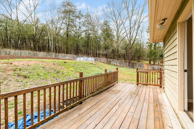 deck featuring a lawn