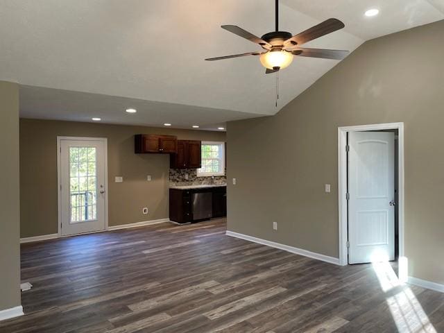 unfurnished living room with recessed lighting, a ceiling fan, baseboards, and dark wood-type flooring