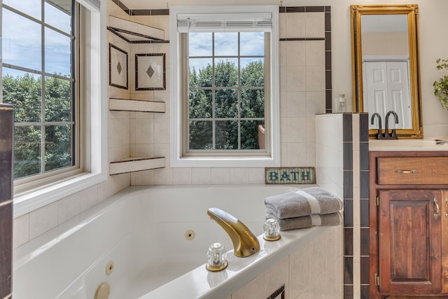 bathroom featuring vanity and a wealth of natural light