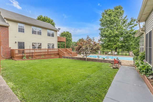 view of yard featuring a pool side deck