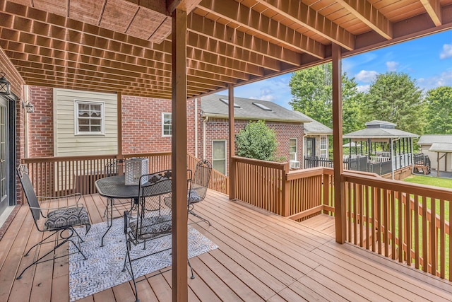 wooden terrace with a gazebo