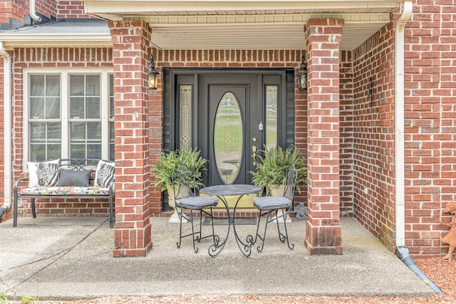 doorway to property with a patio