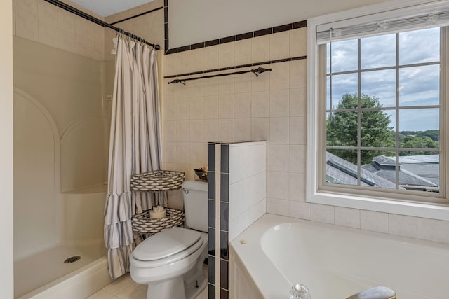 bathroom with tile patterned flooring and toilet