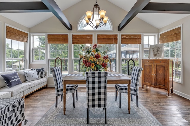 interior space featuring beamed ceiling, dark hardwood / wood-style flooring, high vaulted ceiling, and a chandelier