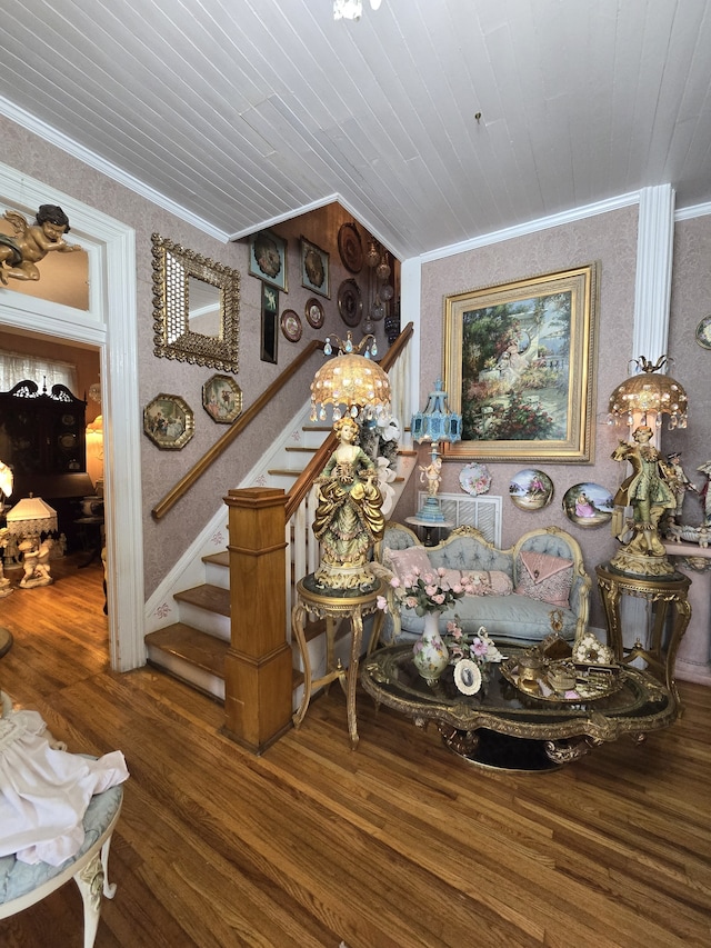 interior space with hardwood / wood-style flooring, crown molding, and wood ceiling