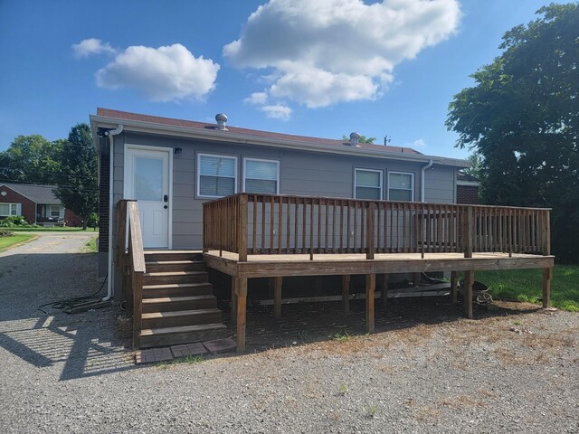 view of front of property featuring a wooden deck