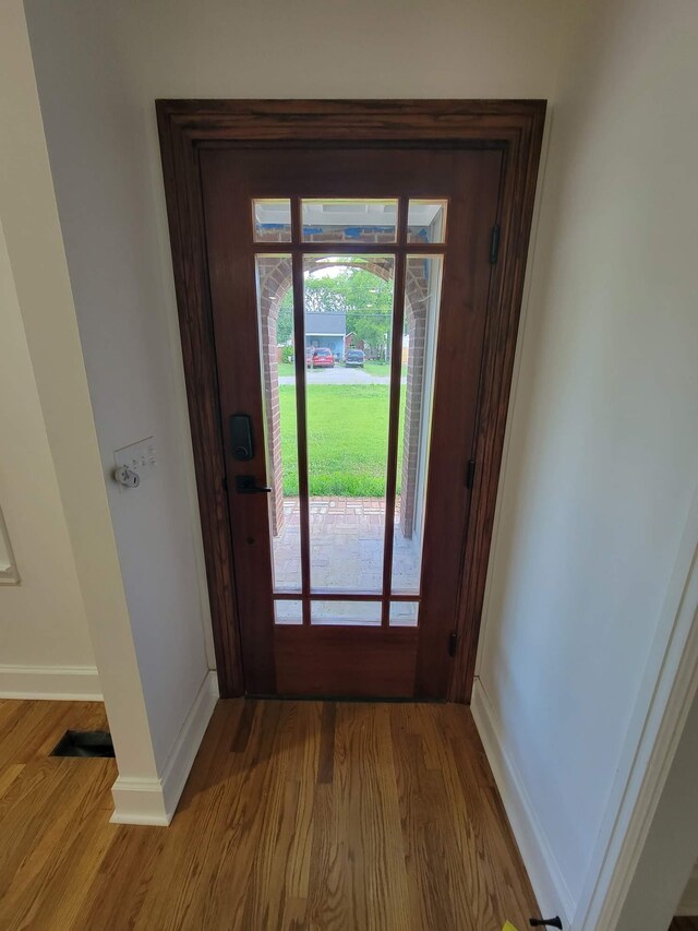 entryway with light hardwood / wood-style floors