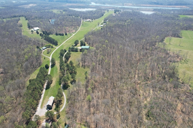 birds eye view of property with a rural view