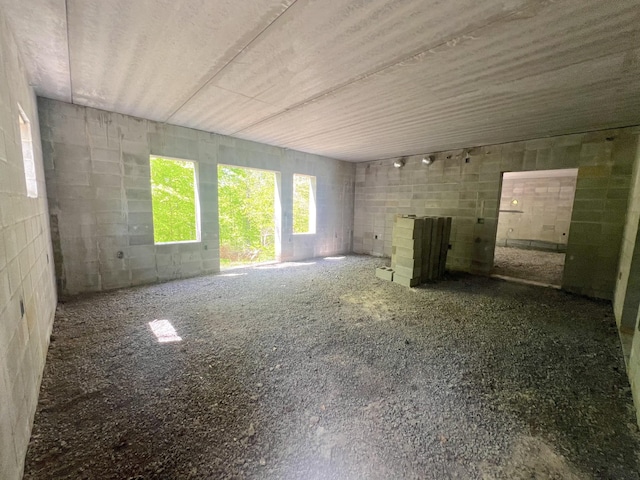 unfurnished living room with a fireplace