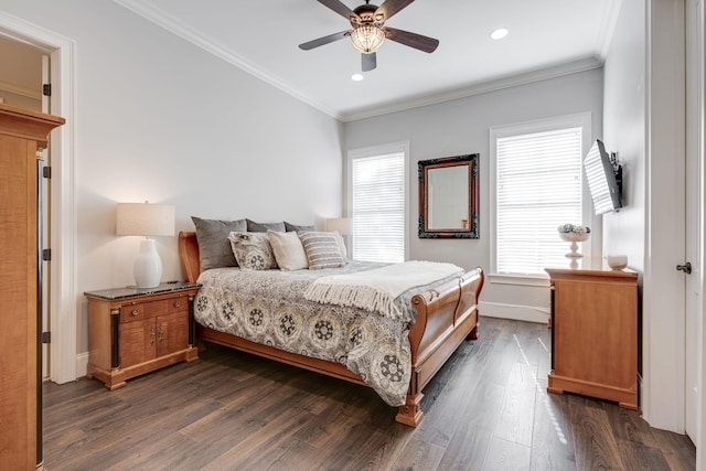 bedroom featuring multiple windows, dark hardwood / wood-style floors, ceiling fan, and ornamental molding