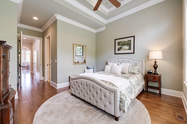 bedroom featuring hardwood / wood-style floors, ceiling fan, and ornamental molding