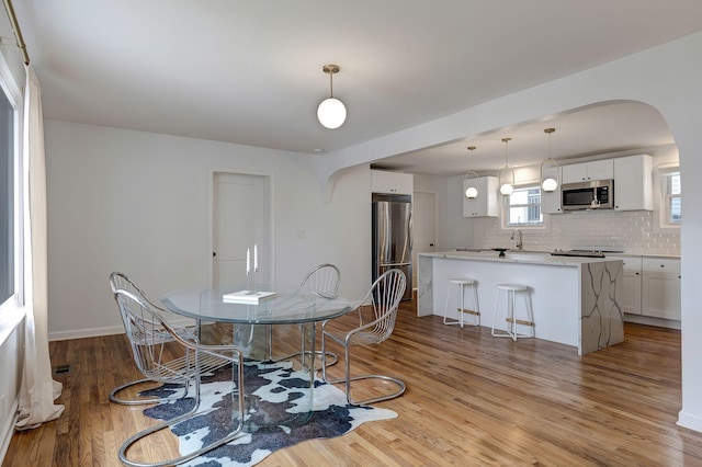 dining space featuring light hardwood / wood-style flooring