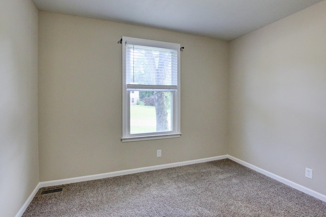 view of carpeted spare room