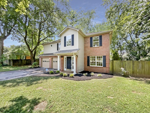 front facade with a garage and a front lawn