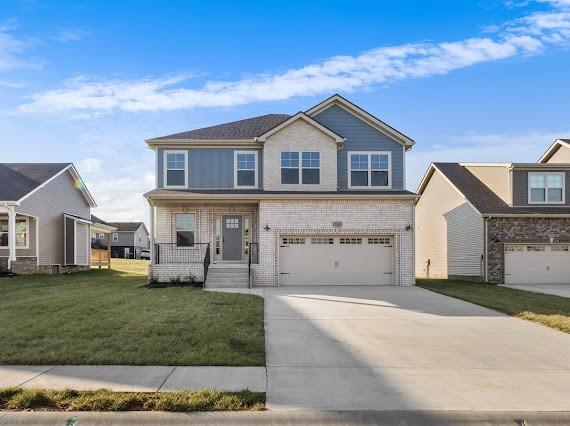 view of front of home featuring a garage, a porch, and a front lawn