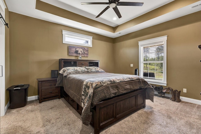 1033 Carter Rd SE, Old Fort, TN 37362 - carpeted bedroom featuring ceiling fan and a raised ceiling