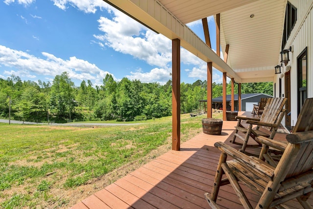 1033 Carter Rd SE, Old Fort, TN 37362 - wooden terrace featuring a lawn