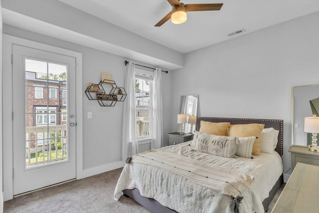 carpeted bedroom with ceiling fan and access to outside