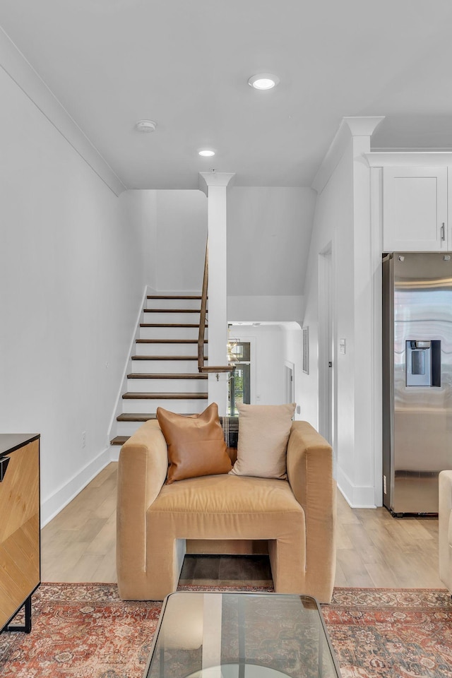 living room with ornamental molding