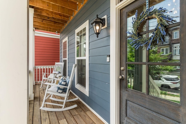 property entrance featuring covered porch