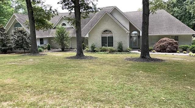 view of front of home with a front lawn