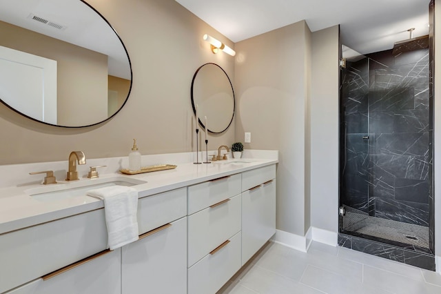 bathroom featuring vanity, tile patterned floors, and walk in shower