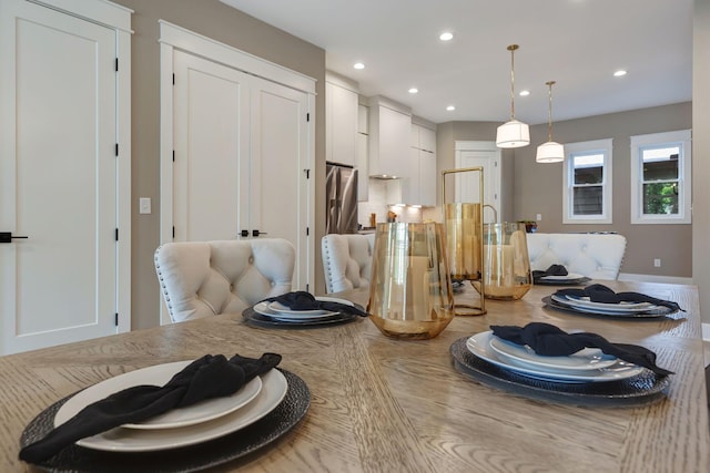 dining room with recessed lighting