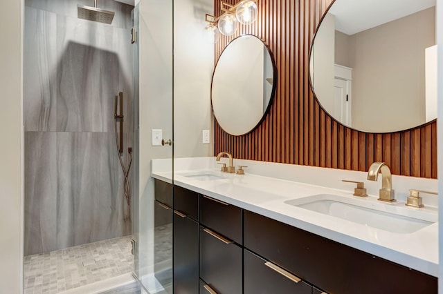 bathroom featuring vanity and an enclosed shower