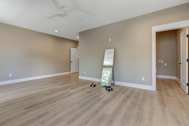 spare room featuring recessed lighting, baseboards, ceiling fan, and light wood finished floors