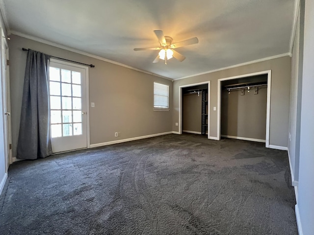 unfurnished bedroom with dark carpet, ceiling fan, and crown molding