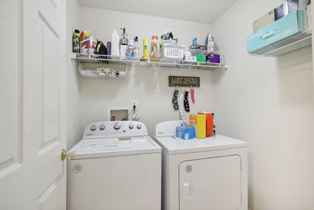 laundry room with washer and dryer